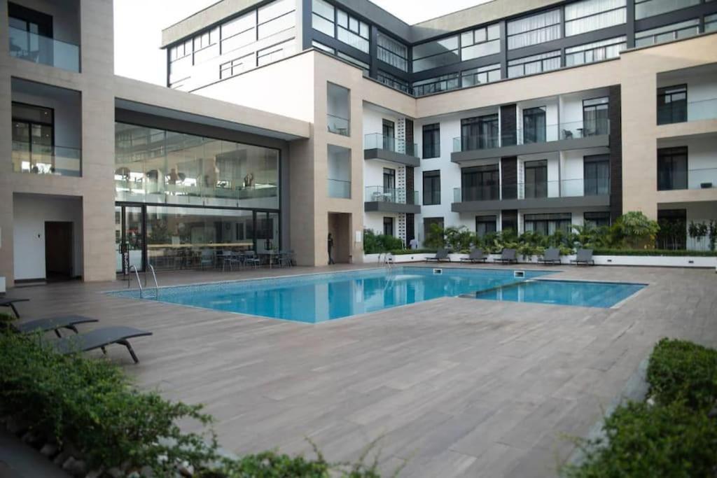 Pool View Apartment @Embassy Gardens Акра Екстериор снимка